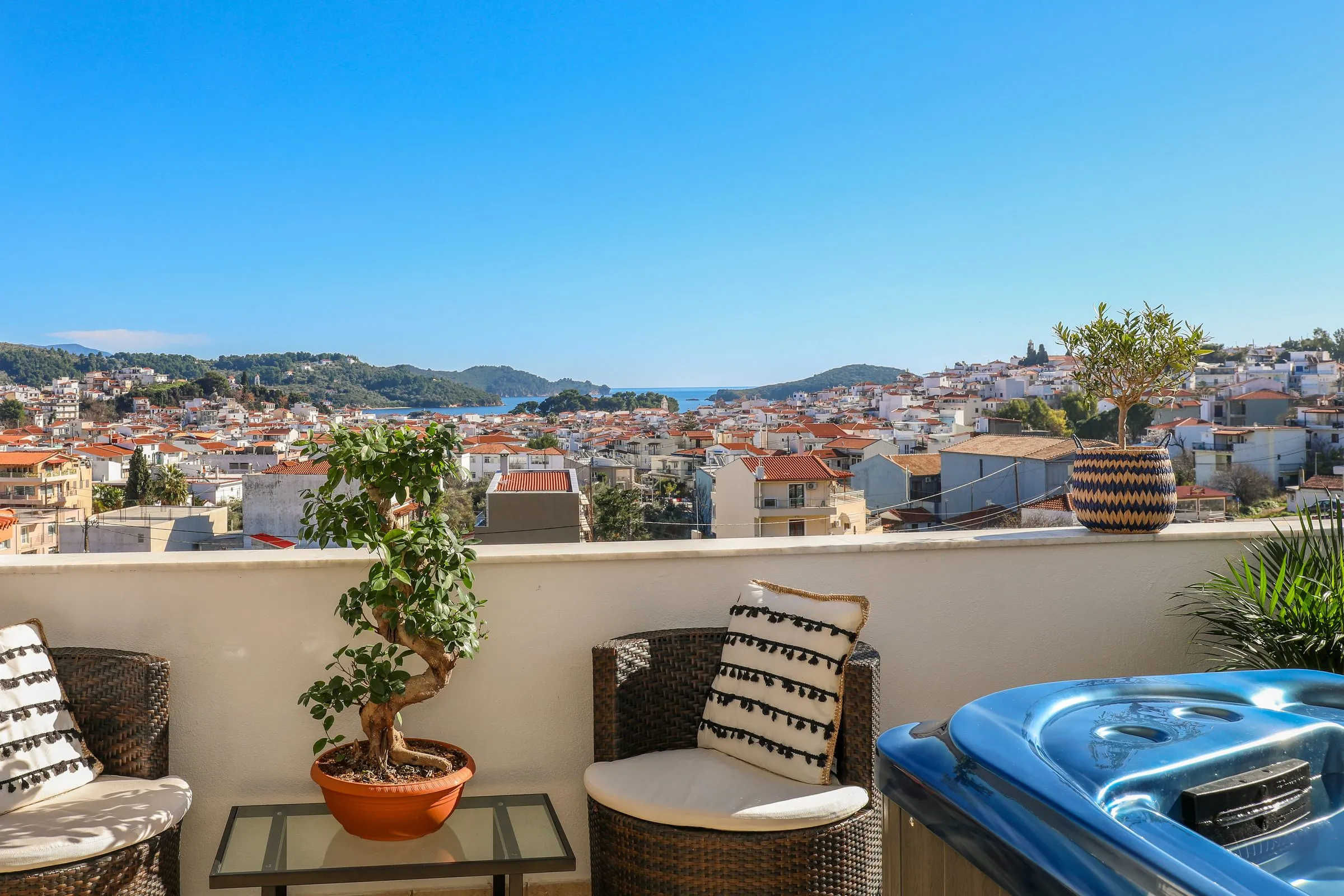 The rooftop terrace at La Fleur, looking over Skiathos Town to the sea